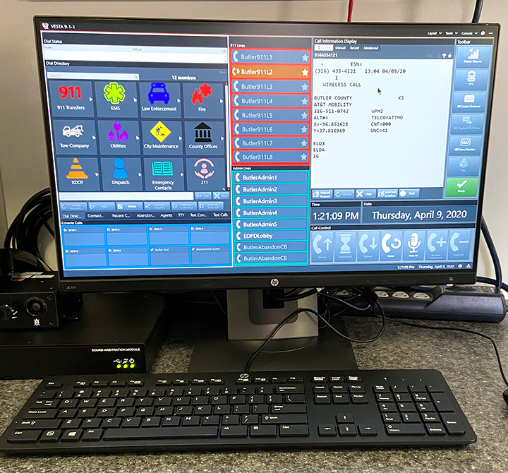 Kansas 911 operating computer screen with AT&T connectivity.