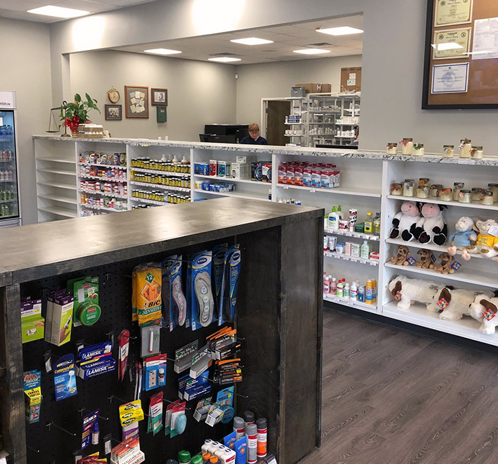 Pharmacy store with shelves of medicine. 