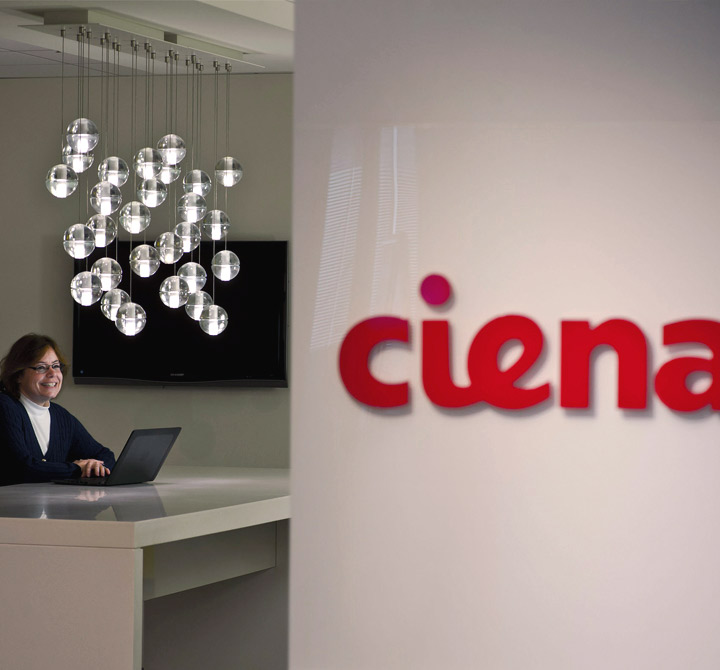 Ciena headquarters with woman at front desk.