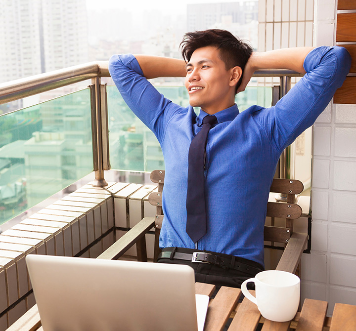 Businessman working remote in a public location