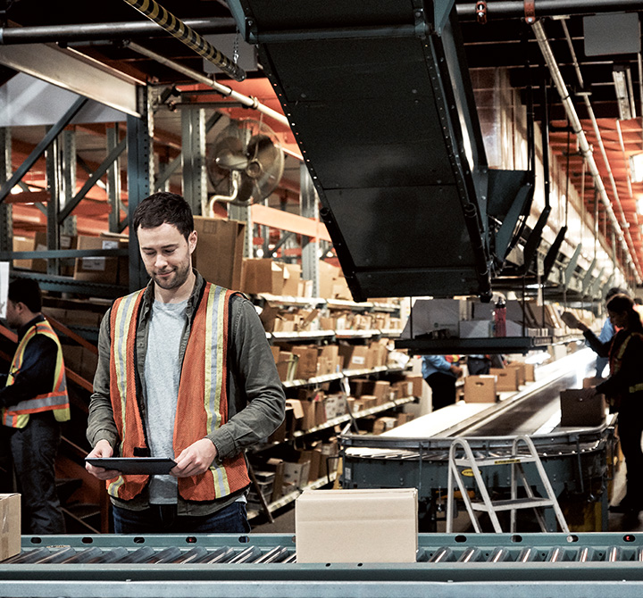 Factory working tracking inventory on a tablet