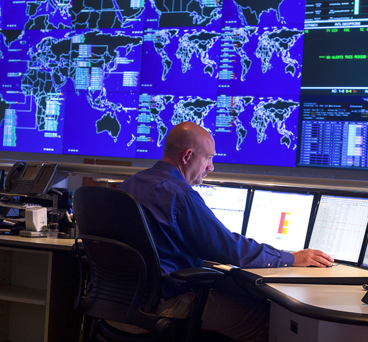 Man working on computer in NOC