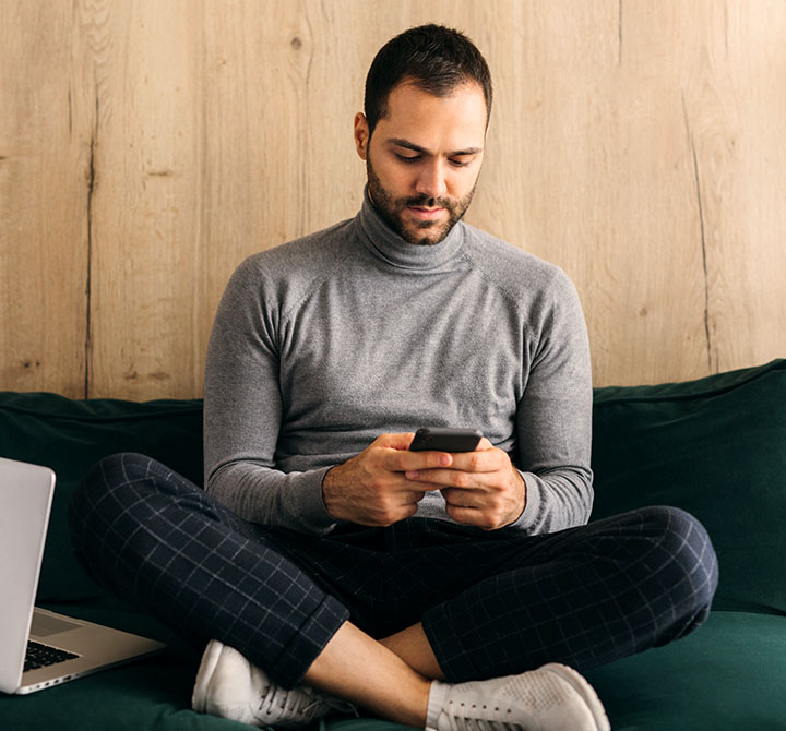 Man using connectivity in home RV