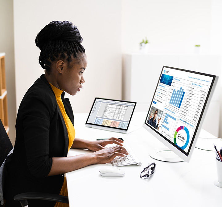 Woman viewing her digital dashboard on her computer
