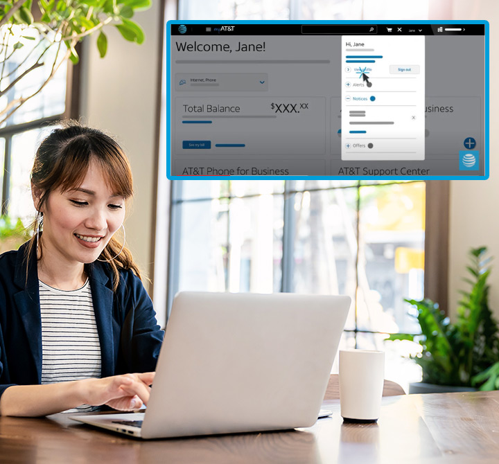 Woman managing her myAT&T account on her laptop