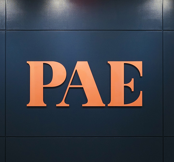 PAE logo on a wall