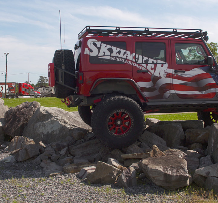 Skyjacker suspensions jeep on top of a rock mound