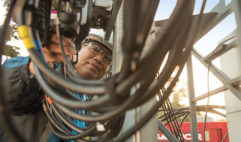 Electrical professional working on commercial wires