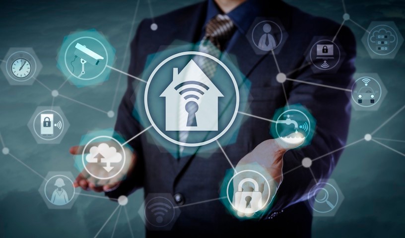 Blue chip business manager activating smart home application network in cyberspace. Technology concept for wireless security and home automation, Internet of Things, remote control and monitoring.