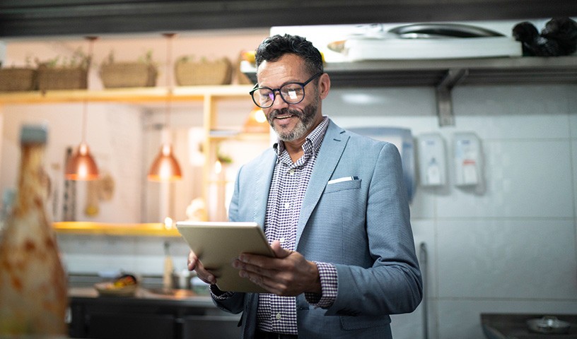 Well dressed man on tablet