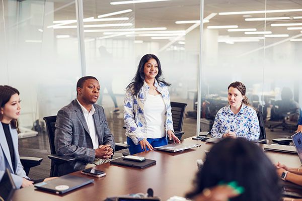 AT&T employees photographed in a meeting room at corporate headquarters in Dallas Texas.