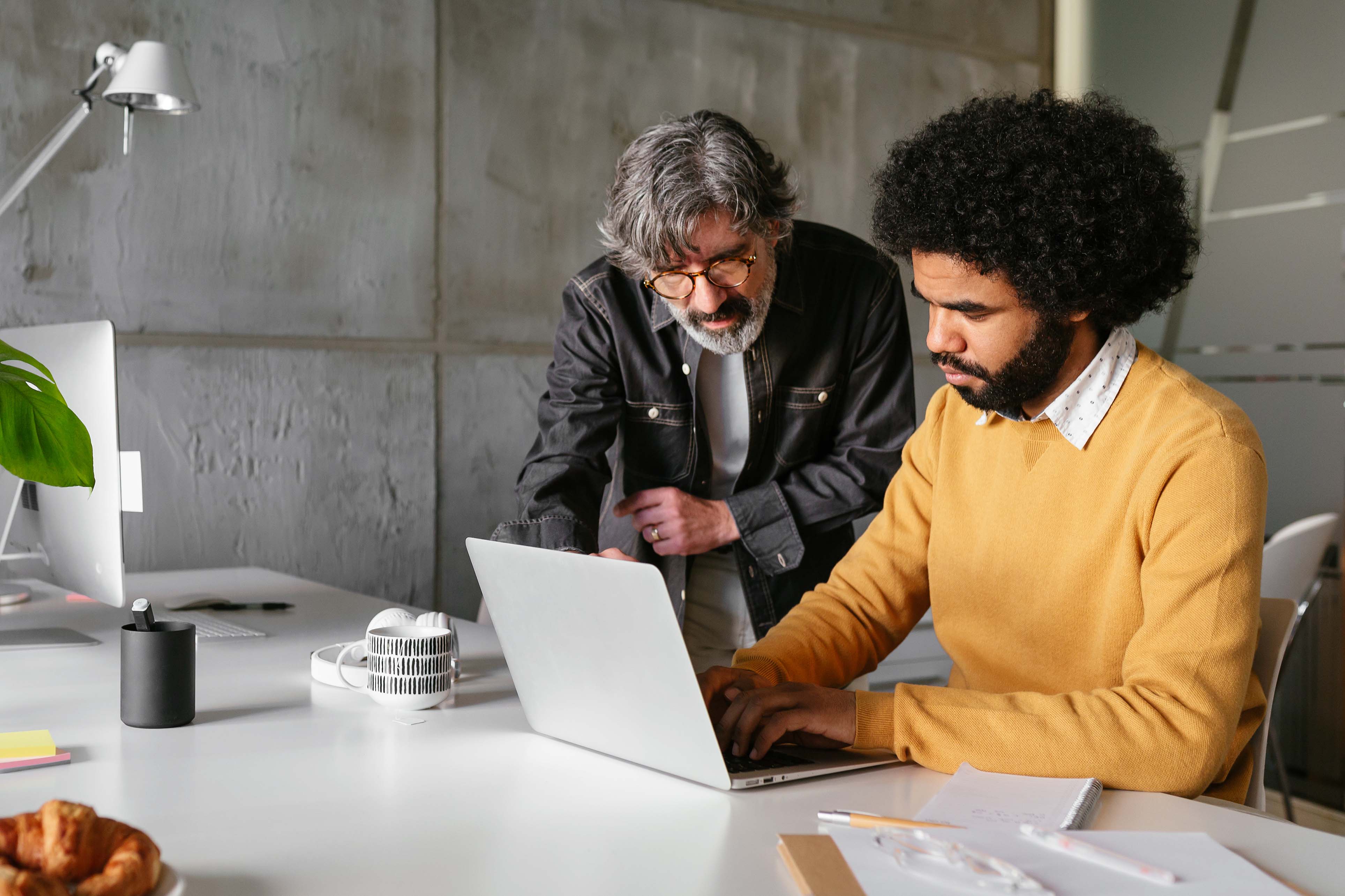 Two men working in an office
