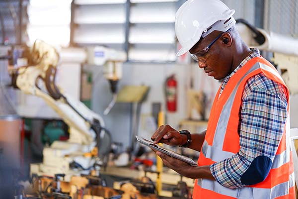 Robotics engineer in manufacturing plant