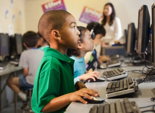 children on computers in classroom
