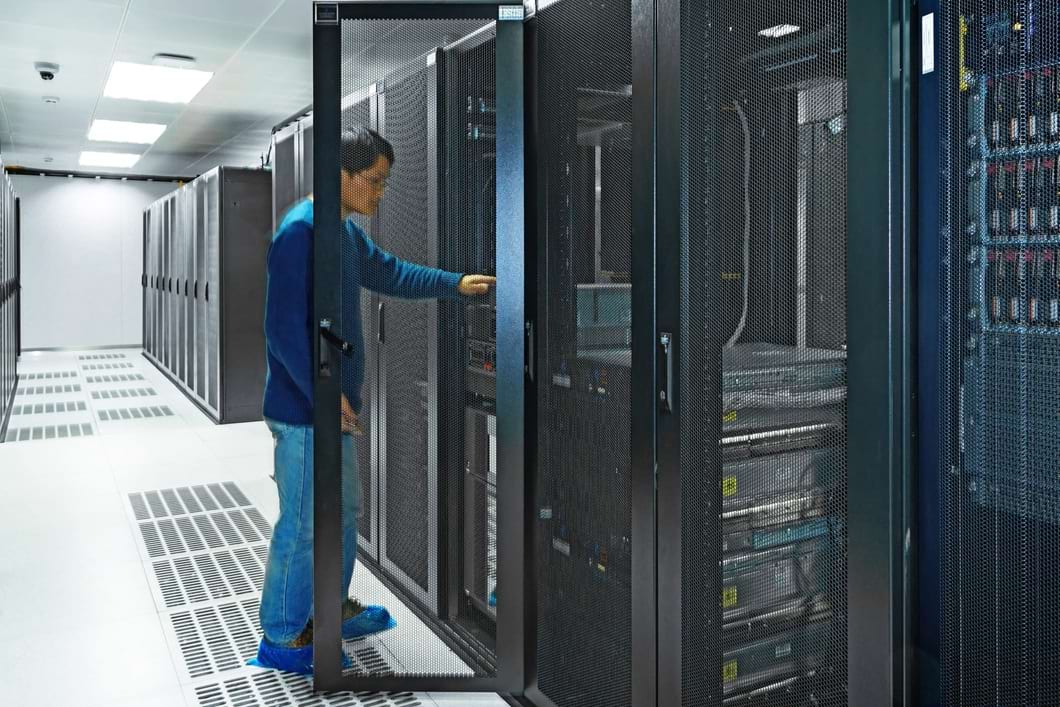 Computer Technician/network administrator working on a server