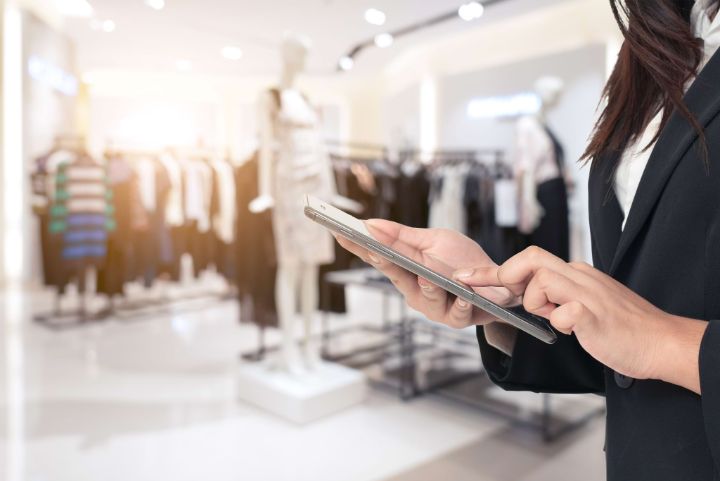 Businesswoman using digital tablet in the shopping mall.